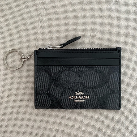 mini skinny id case in signature canvas